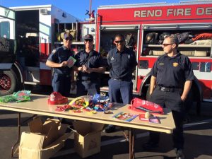Fire fighters at a family health festival. Photo courtesy of TMHC.